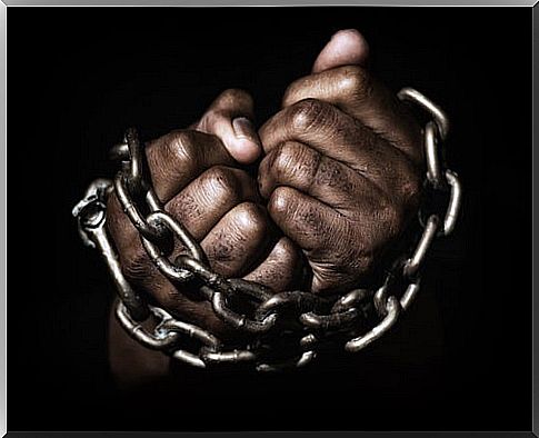 Chained hands symbolizing slavery