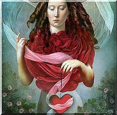 woman holding a heart