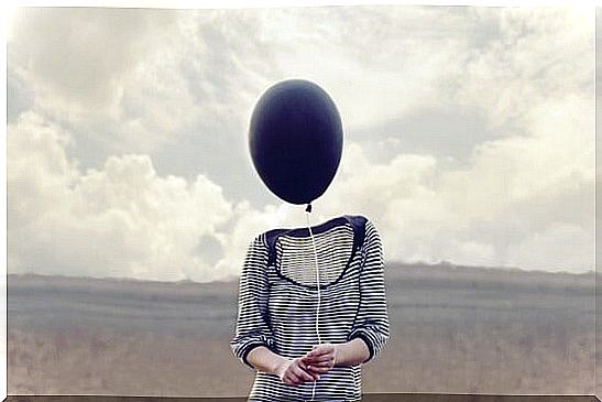 woman with balloon in her head thinking about being and not doing