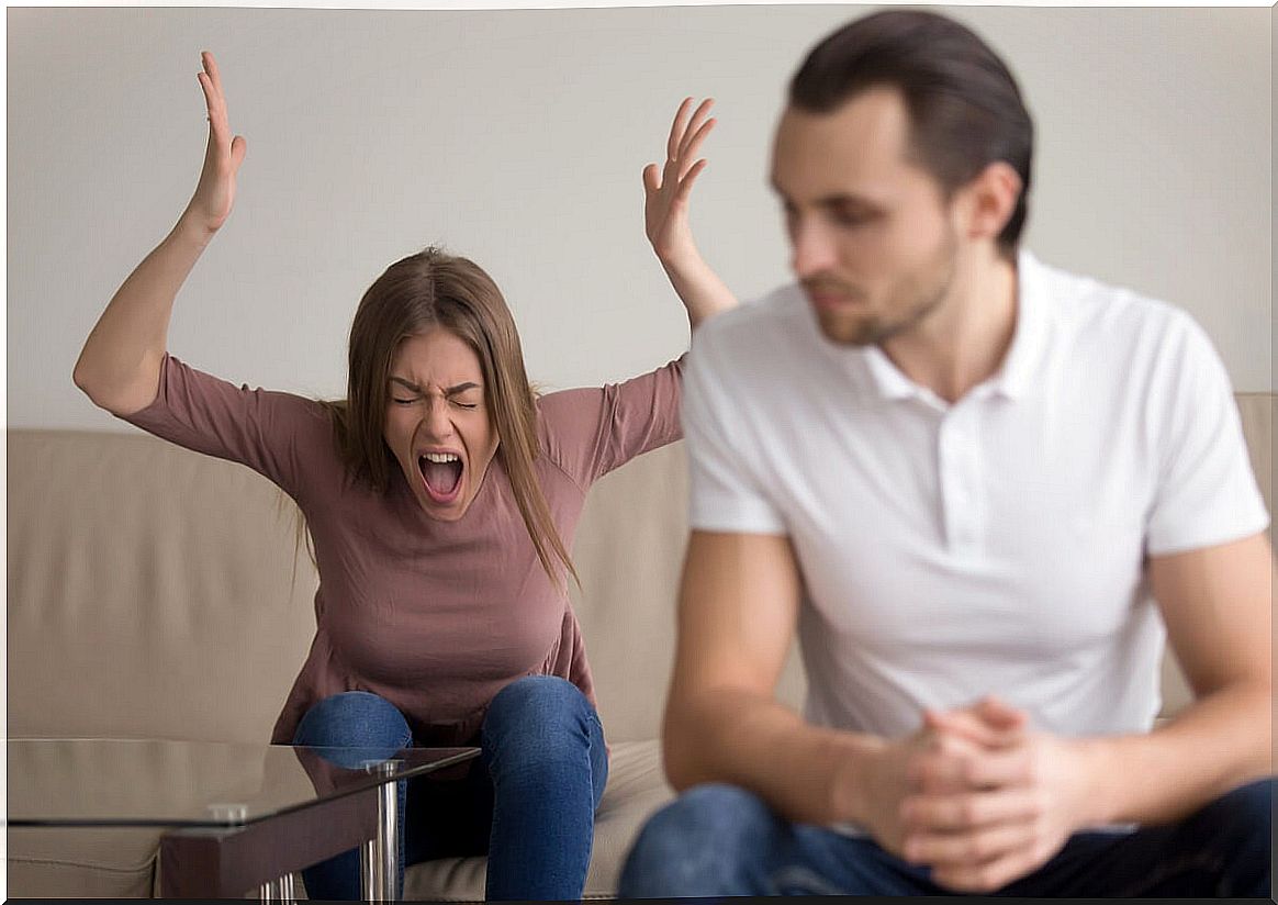 Angry screaming woman showing emotional reactivity 