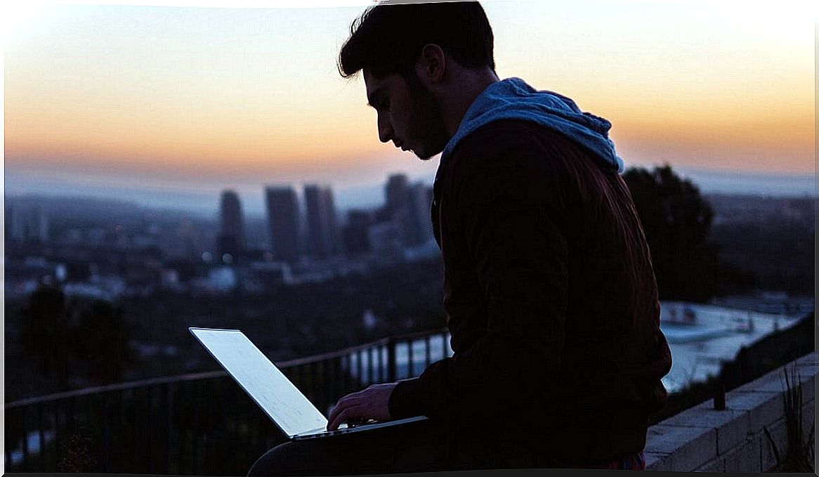 boy working with computer trying to be successful at work