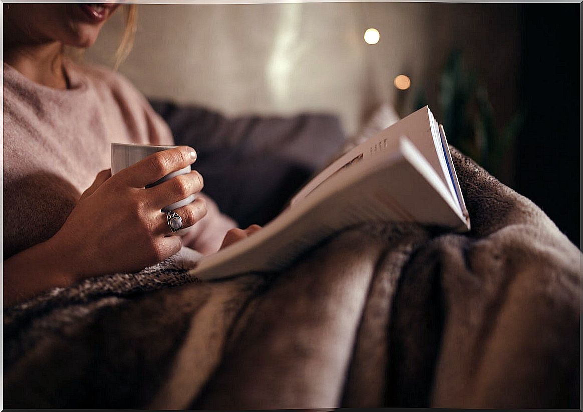 Woman reading clothed