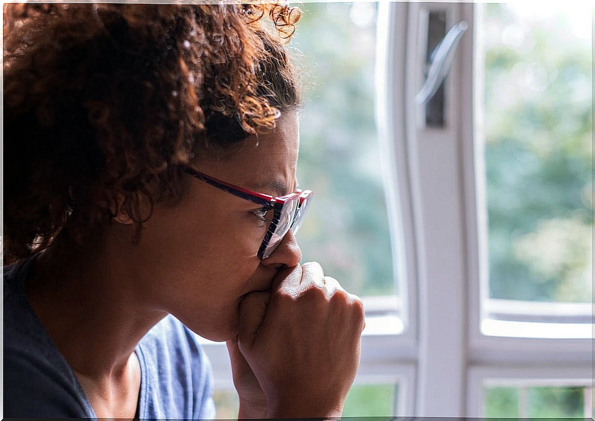 Woman thinking how to stop thinking about something