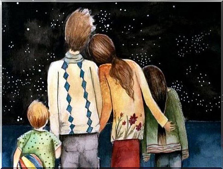 Family looking at the starry sky