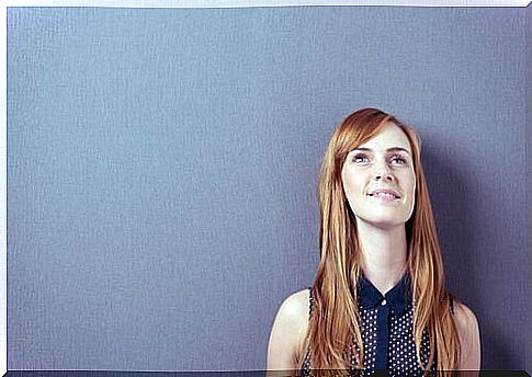 Woman thinking looking up