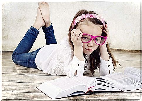 Girl studying a bored book