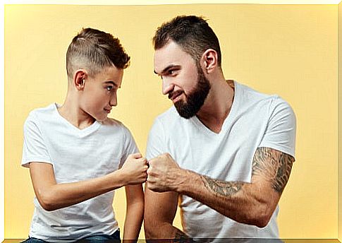 Father and son high-fiving