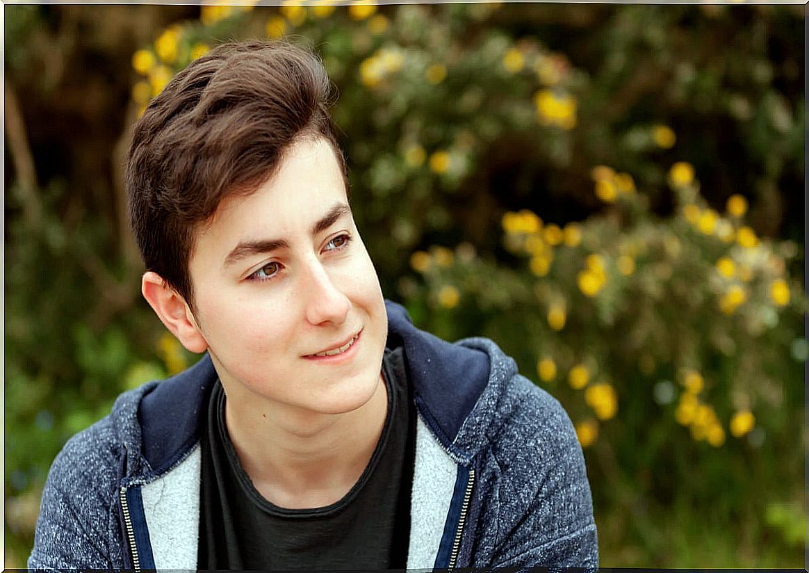 Teen boy thinking sitting