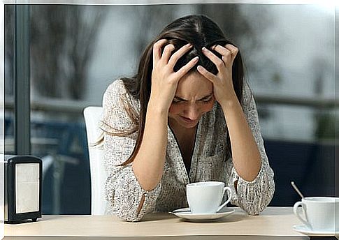 Angry woman with a cup of coffee