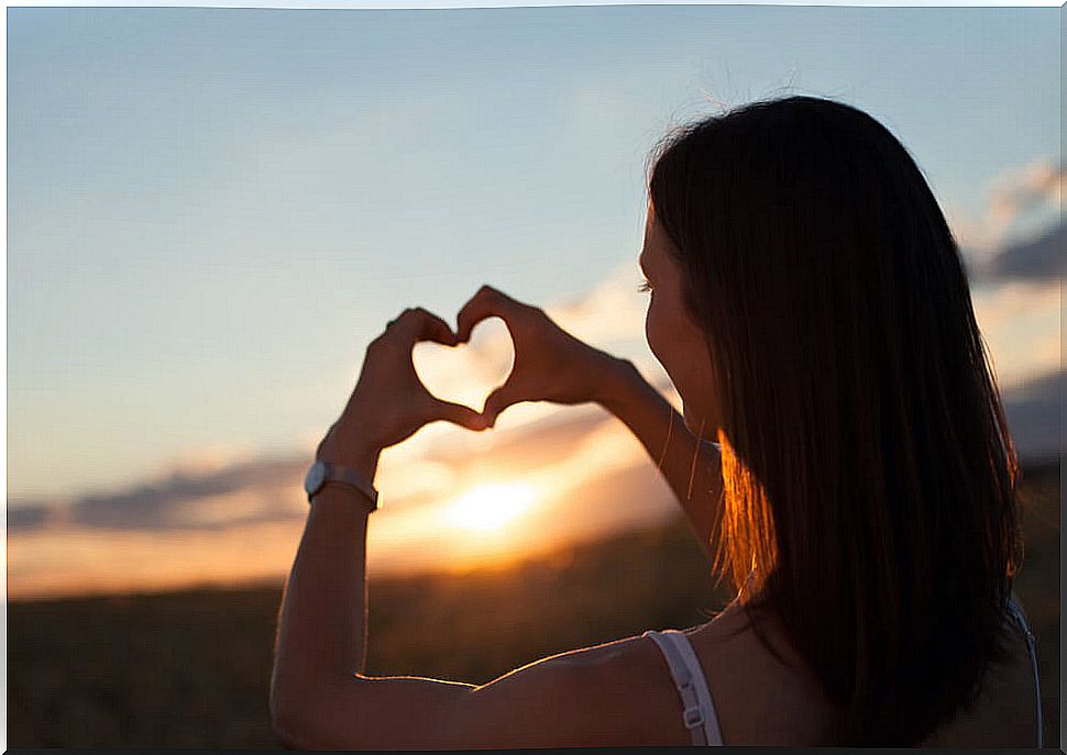 Woman making a heart with her hands