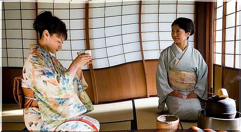 women performing tea ceremony