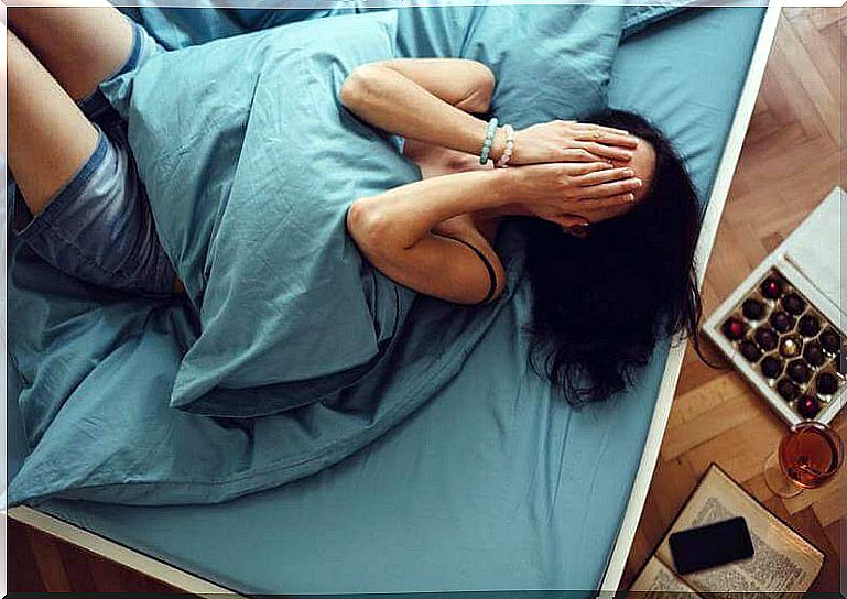 Woman in bed with insomnia