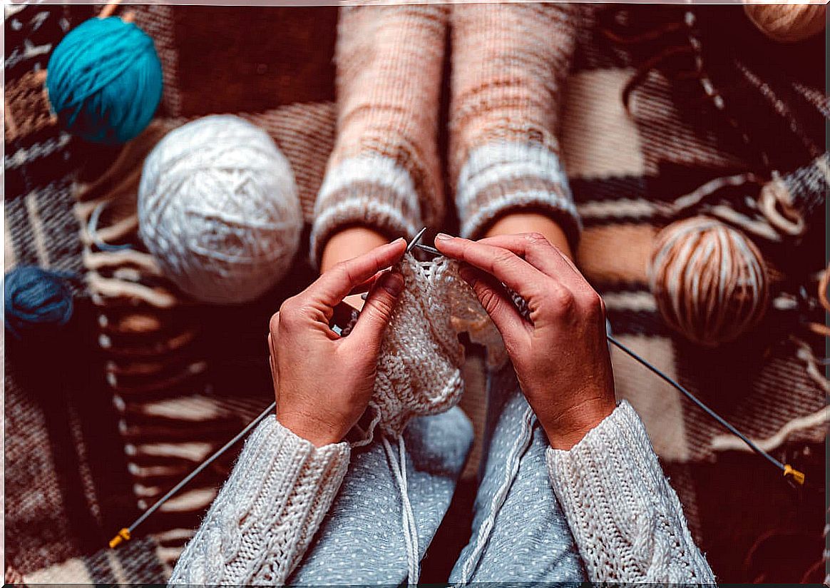 Woman knitting socks