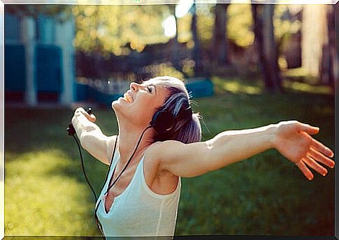 Free woman listening to music