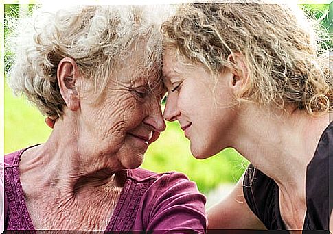 Woman caring for her elderly mother