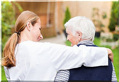 Doctor caring for elderly patient