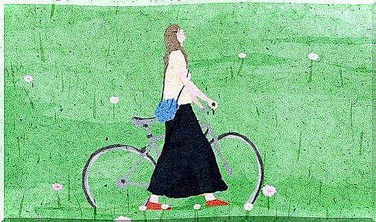 girl on bike thinking about changing her mind